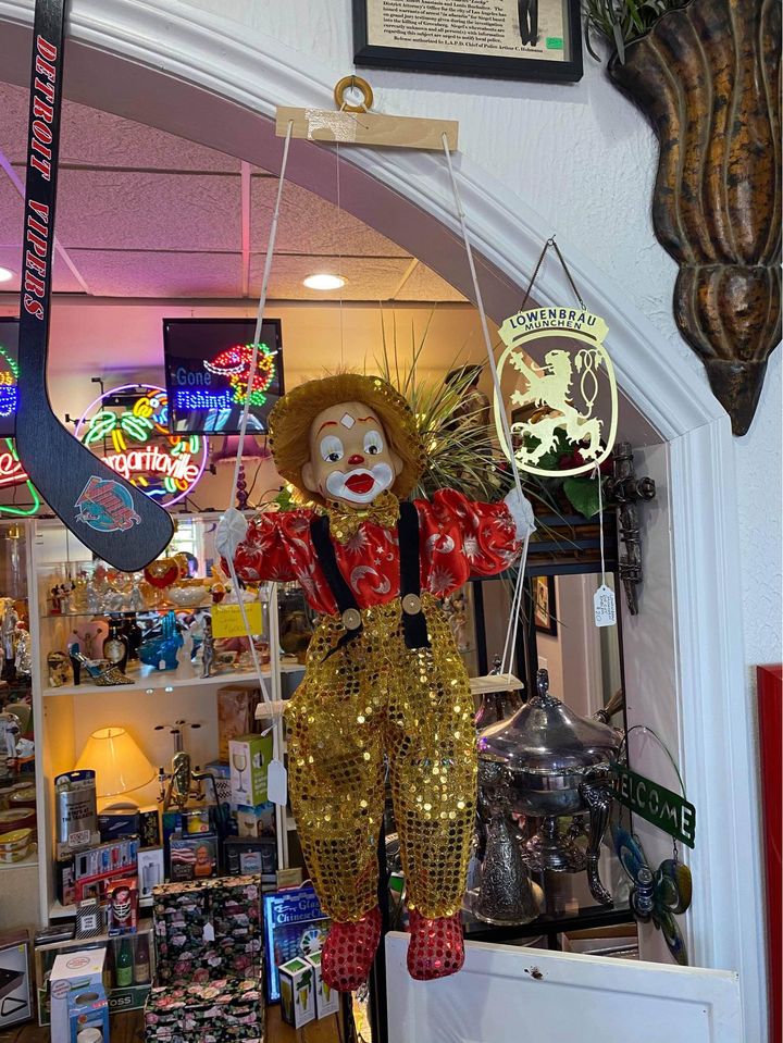 porcelain clown on swing